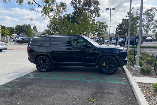 Arrival by Eco SUV from Las Vegas Airport to Las Vegas City - The ride in a Rivian R1S electric SUV (up to 3 people)