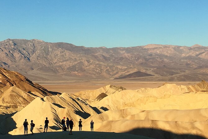 Death Valley Sunrise & Stargazing Day Tour Group Discount for 2 More People - Zabriskie Point: the golden stratum under morning light