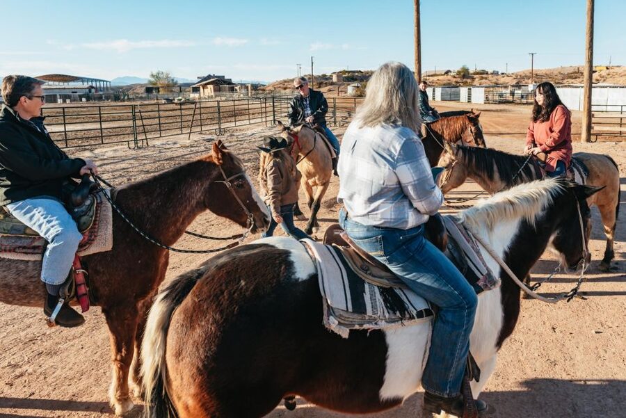 From Las Vegas: Desert Sunset Horseback Ride with BBQ Dinner - Leaving the Las Vegas Strip Behind: Pickup, Van Ride, and First Impressions