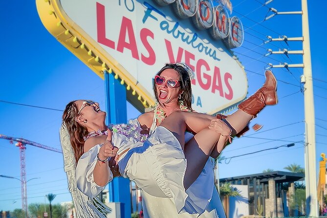 Get Married: Elvis Wedding + Las Vegas Sign + Photography - Photos and keepsakes: five candid digitals plus plenty of phone-camera time