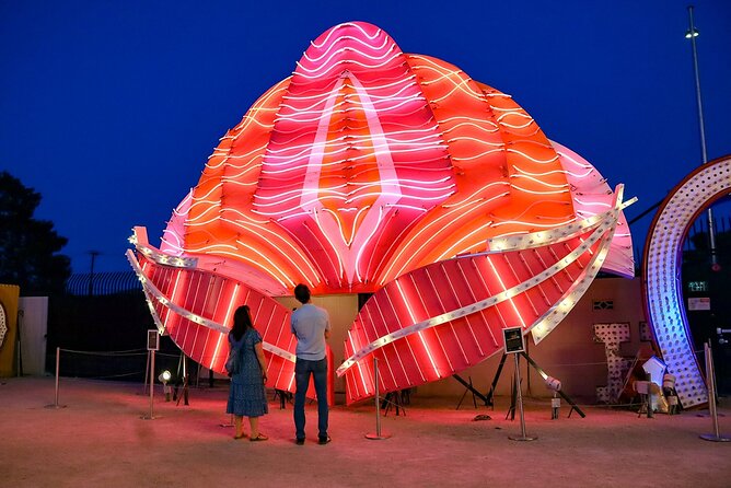 Las Vegas: Neon Museum Night Experience and Open-Top Bus Tour - The Strip by night: drive-by mega-hotel landmarks and downtown energy