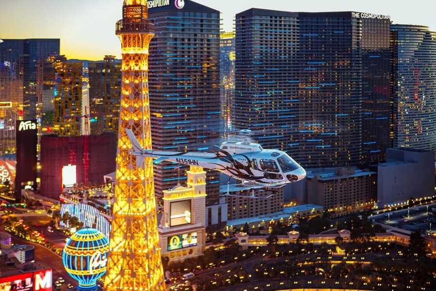 Las Vegas: Nighttime Helicopter Flight over the Strip - High Roller, The STRAT, and the Fremont Street Shortcut Feeling