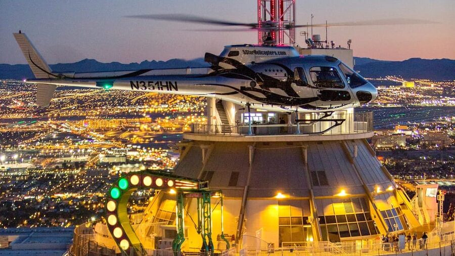 Las Vegas: Nighttime Helicopter Flight over the Strip - Bellagio Fountains, City Center, T-Mobile Arena, and Luxor’s Space Beam