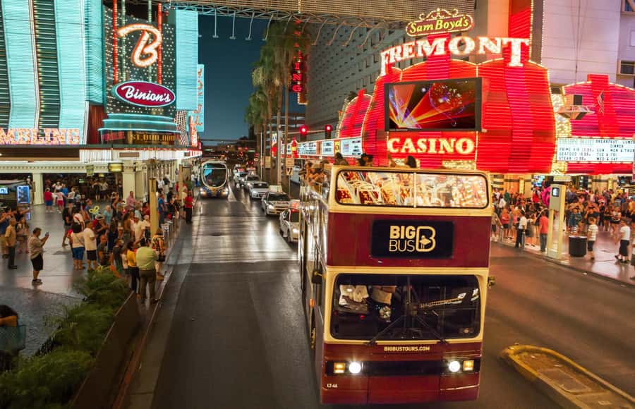Las Vegas: Vegas After Dark Night Tour with Free Drink (21+) - Open-top double-decker views: the fun part and the weather reality