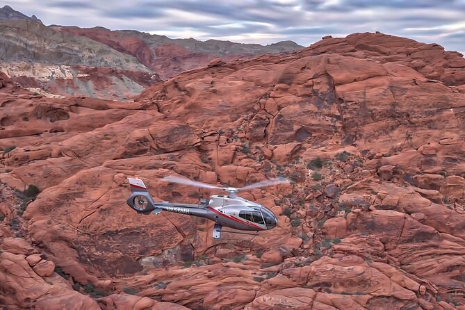 Red Rock Canyon Helicopter Tour with Landing and Champagne Toast - Return Flight Over Vegas: Caesars, Bellagio, Luxor, and More