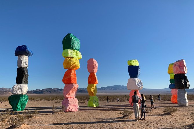 Small Group Grand Canyon, Hoover Dam, 7 Magic Mountains VIP Tour - Morning logistics: pickup timing, van comfort, and the first Vegas photo stop