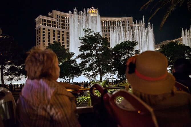 Viator Exclusive: 10:15PM Las Vegas Night Tour by Open-Top Bus - Passing the Ferris wheel and fountains: best enjoyed as a nightly spectacle